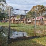 Peligro latente en Belén: Vecinos de La Amistad exigen la recuperación urgente de cancha deportiva convertida en foco infeccioso